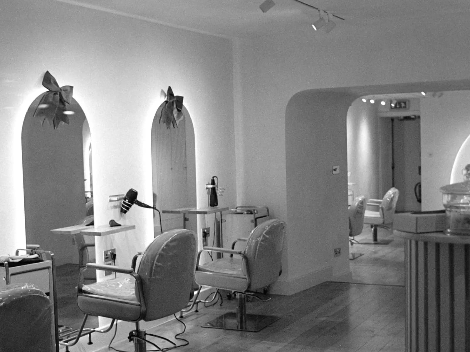 A finished salon interior in Kathmandu with mirror walls and styling stations