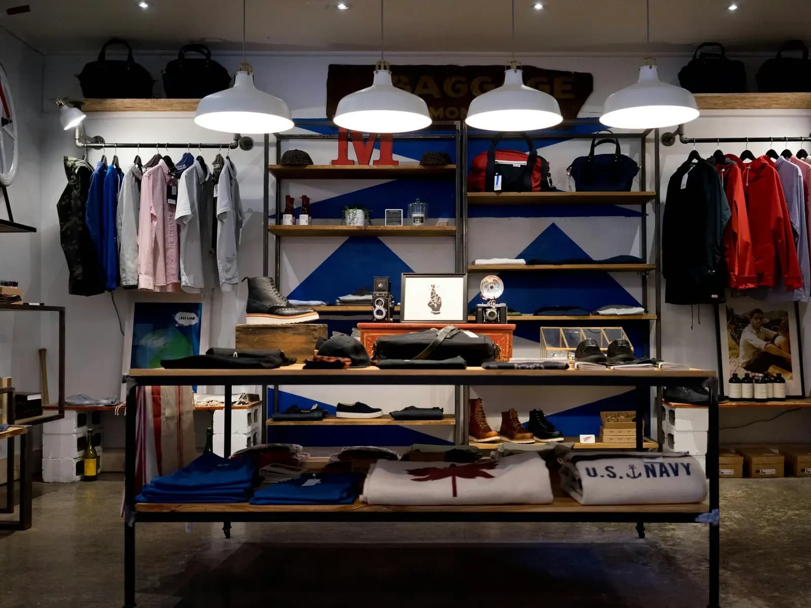 A finished retail shop fit-out in Kathmandu with display shelving and a cash counter